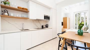 Comfort Apartment, 1 Bedroom, Balcony, City View (Apt. B) | Private kitchen | Full-size fridge, microwave, stovetop, dishwasher