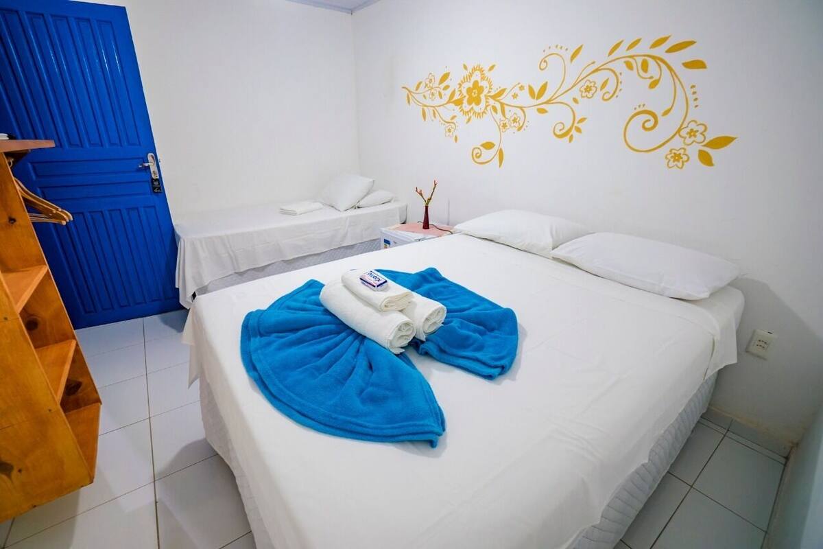 Family Triple Room, Garden View | Minibar, iron/ironing board (on request), WiFi (free), bed sheets