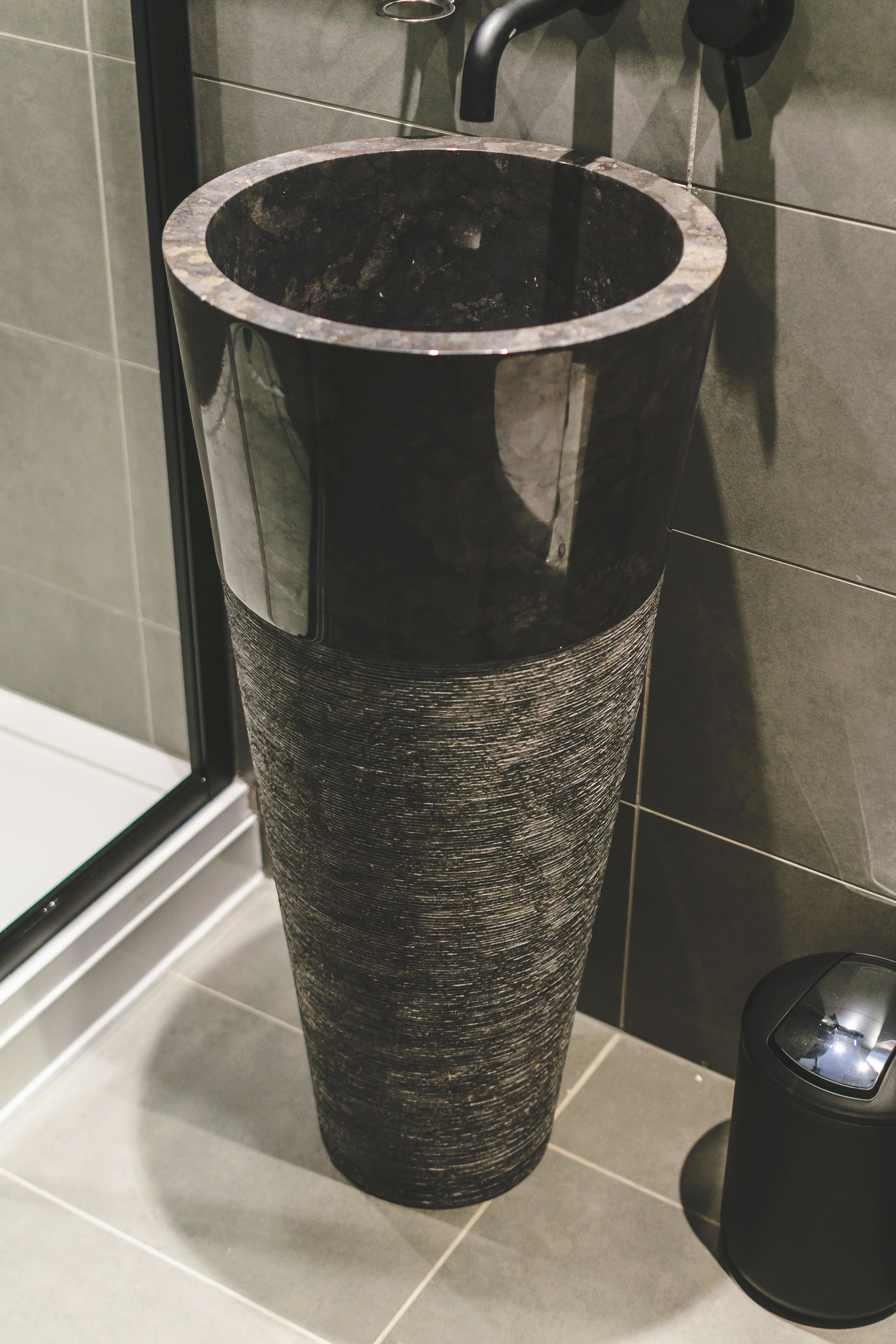 shower, designer toiletries, hair dryer, towels