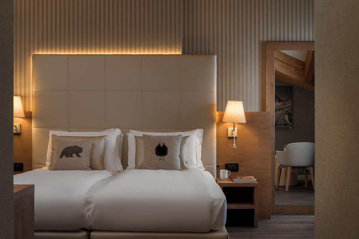suite | premium bedding, down duvets, minibar, in-room safe