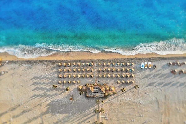 Private beach, sun-loungers, beach umbrellas, beach bar