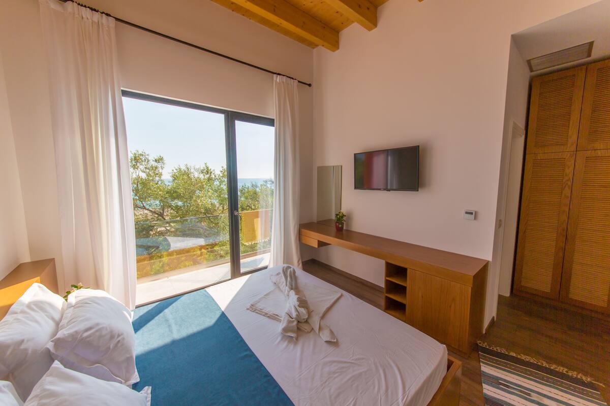 Familienzimmer, Balkon, Meerblick | Strand-/Meerblick