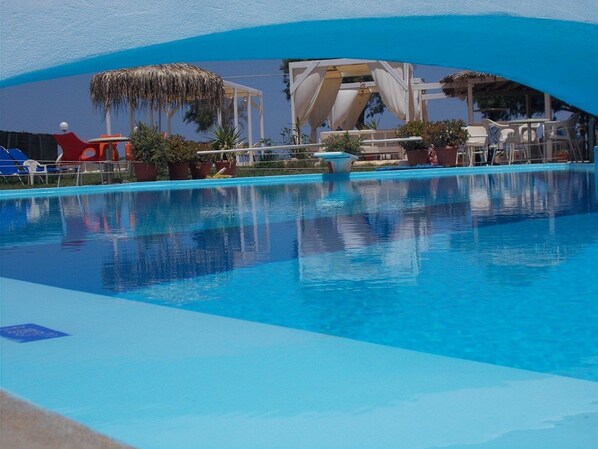 Outdoor pool, pool umbrellas, pool loungers