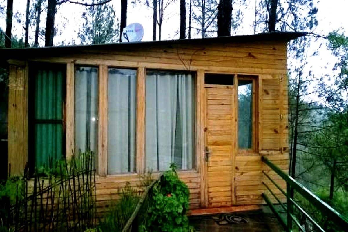Deluxe boomhut, 1 tweepersoonsbed, uitzicht op heuvels | 1 slaapkamer, individueel gemeubileerd, een strijkplank/strijkijzer