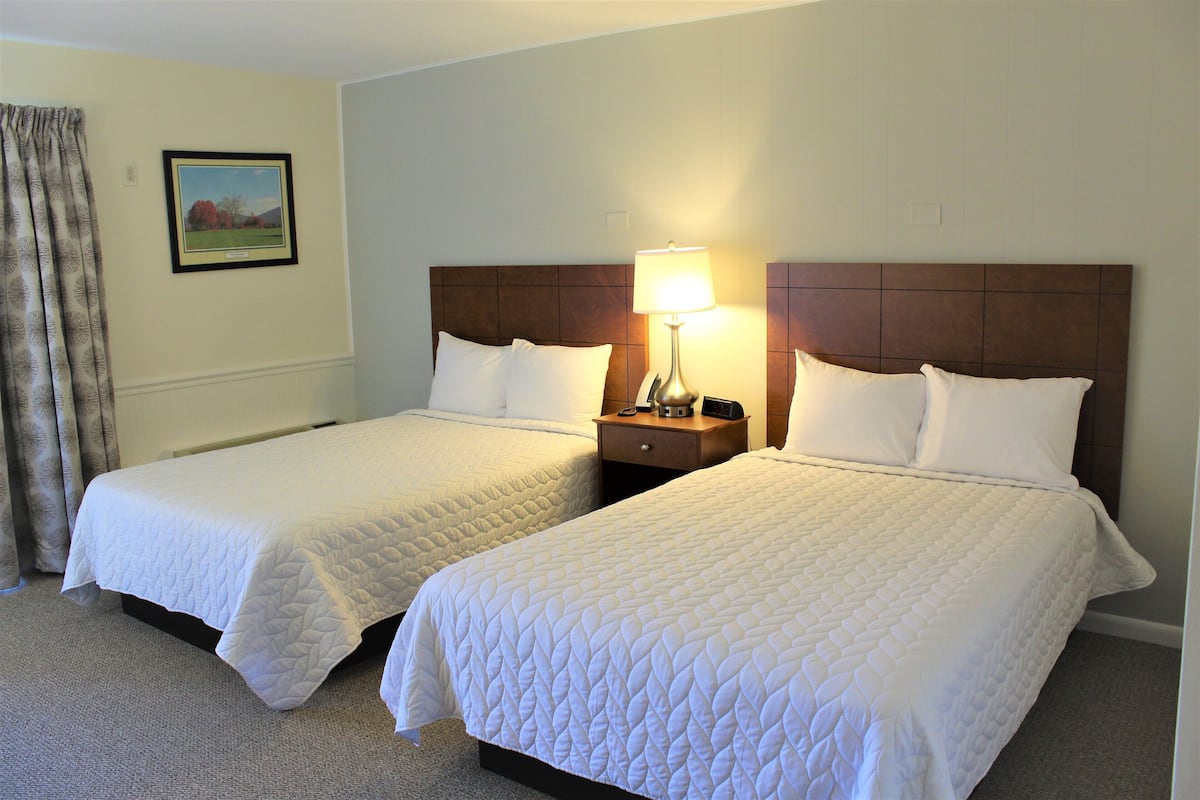 2 Double Beds, Lower Level, Mountain View | Blackout drapes, free WiFi, bed sheets