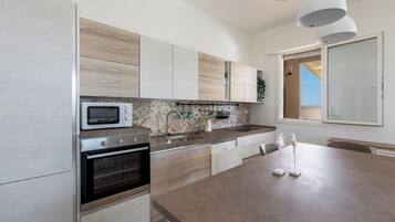 Standard House, 2 Bedrooms (1325) | Private kitchen | Full-sized fridge, oven, stovetop, cookware/dishes/utensils