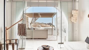 Grande Suite | Living area | 42-inch Smart TV with satellite channels, TV, Netflix