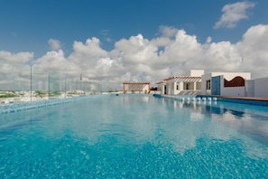 Outdoor pool, pool umbrellas, pool loungers
