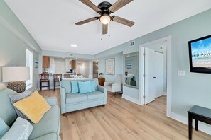 Comfort Condo, 3 Bedrooms, Balcony, Beach View | Living room | 32-inch flat-screen TV with cable channels - Boardwalk Condos by Hosteeva (Gulf Shores)