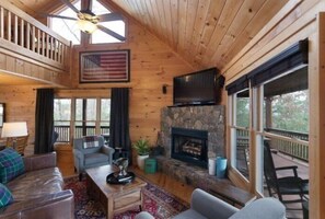 Maison | Coin séjour | Télévision à écran plat, cheminée