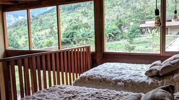 Family Bungalow, Mountain View | Minibar, individually decorated, individually furnished, blackout drapes