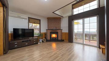 Room (30 PY/ No Extra Towel) | Living area | Flat-screen TV
