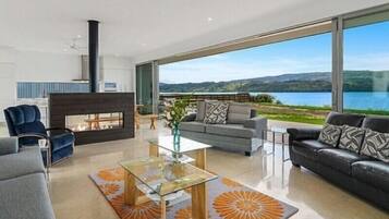 Luxury House, Multiple Beds, Lake View | Living area | Flat-screen TV, fireplace