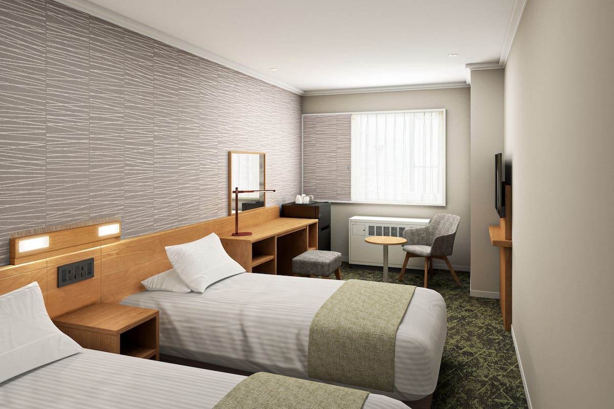 Quarto duplo, para não fumantes | 1 quarto, cofres nos quartos, Wi-Fi de cortesia, roupa de cama