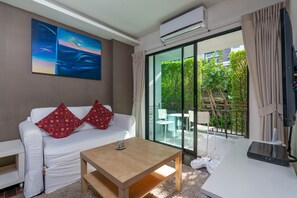 Deluxe Apartment, 1 Queen Bed, Garden View | Living room - Title Rawai by Rents In Phuket (Rawai)