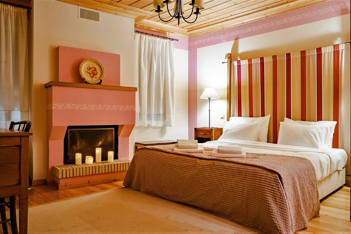 Phòng Suite Junior, quang cảnh núi | Bộ trải giường bằng vải Frette của Ý, bộ đồ giường cao cấp