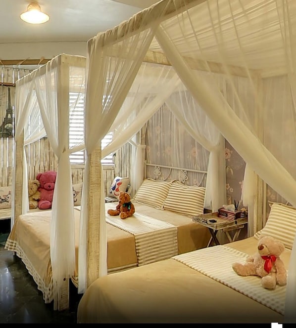 Family Quadruple Room, 2 Double Beds, City View (Bay) | Down comforters, individually furnished, soundproofing, free WiFi