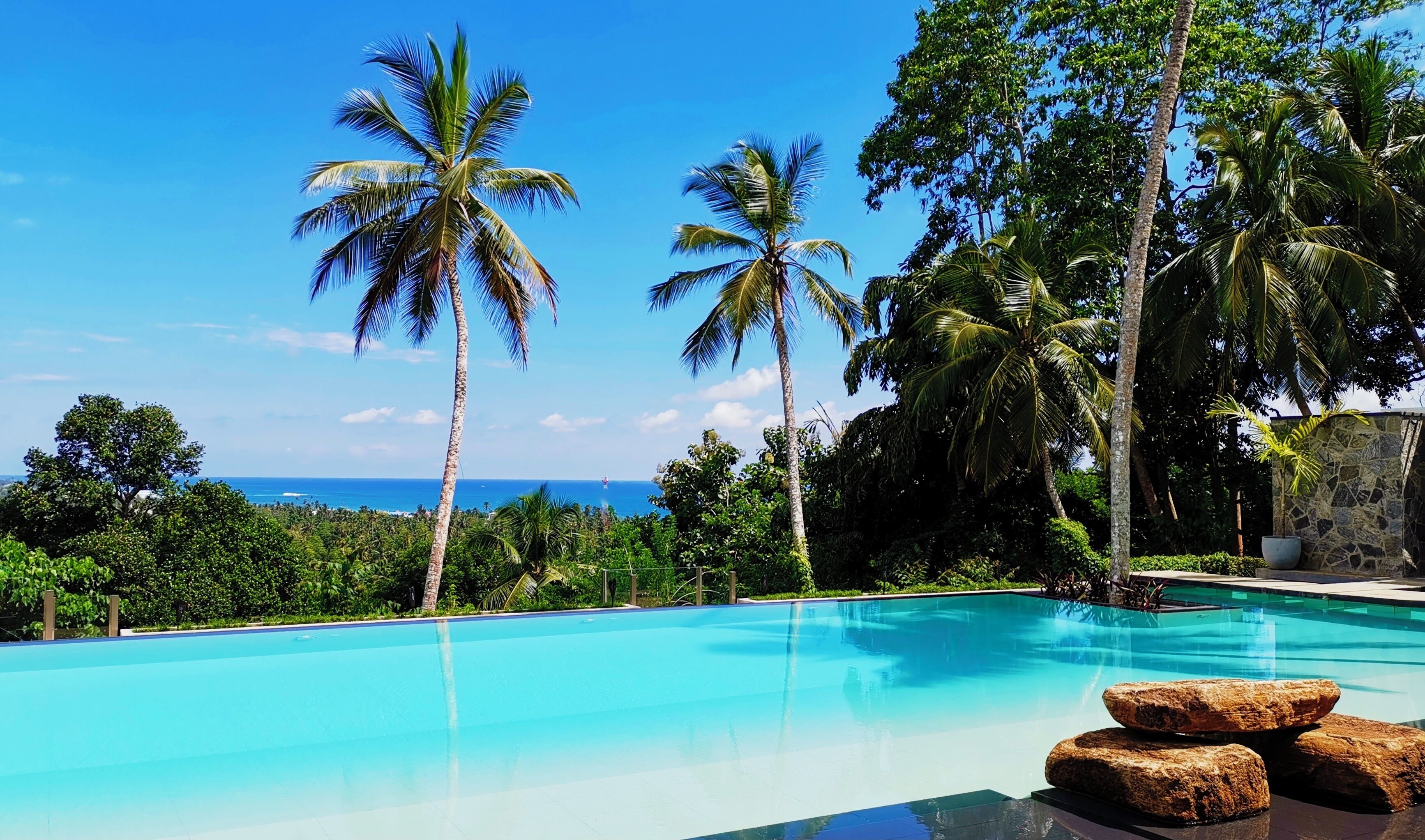 Outdoor pool, open 7:00 AM to 8:00 PM, pool loungers