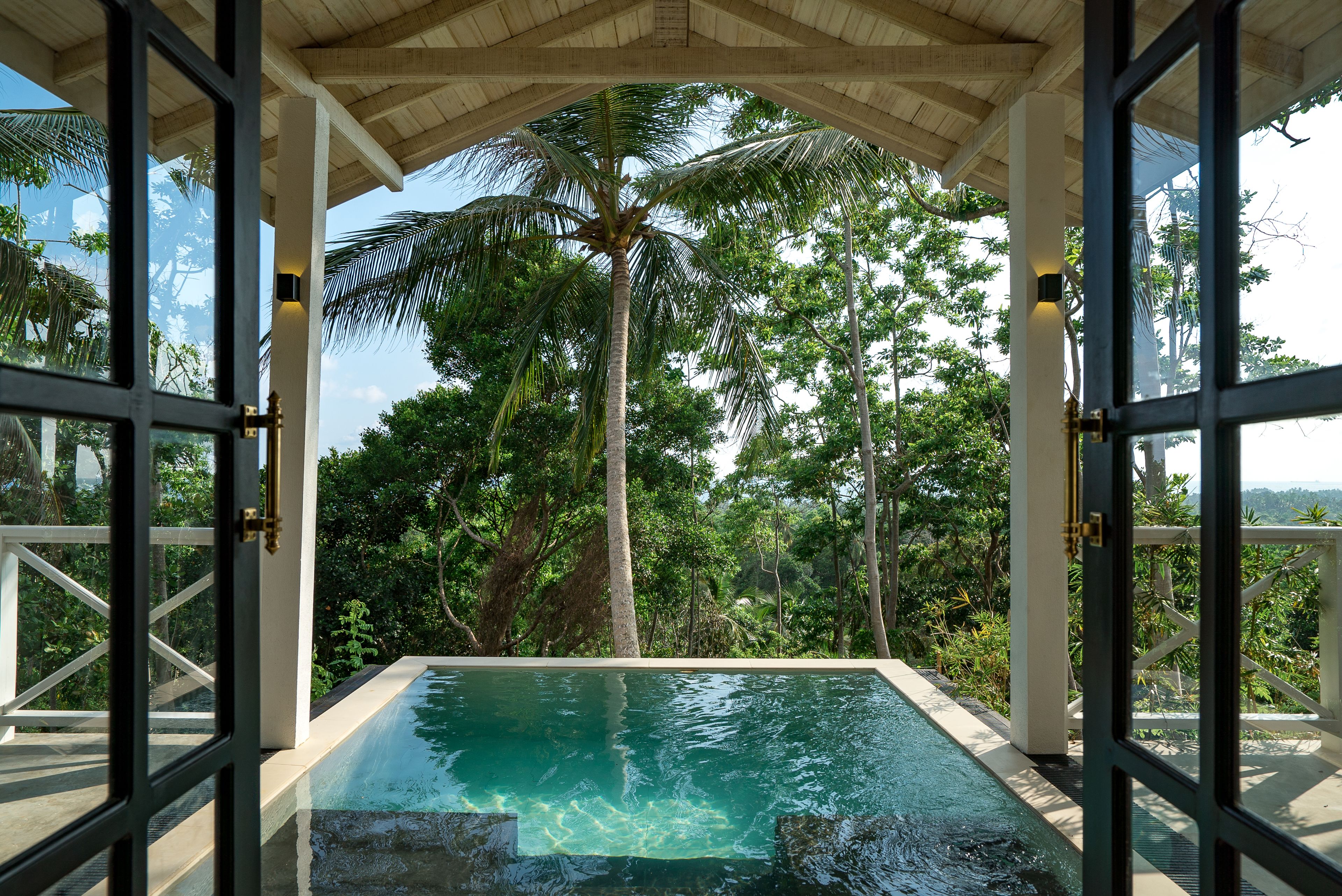 Outdoor pool, open 7:00 AM to 8:00 PM, pool loungers