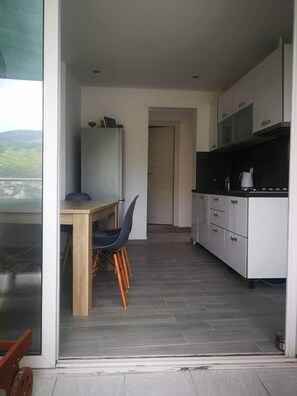 Apartment, Multiple Beds | Private kitchen