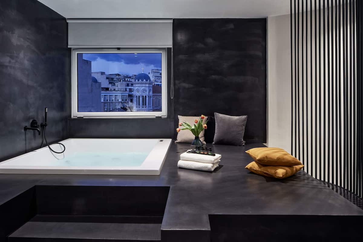 loft, 1 king bed, jetted tub | bathroom | shower, rainfall showerhead, free toiletries, hair dryer