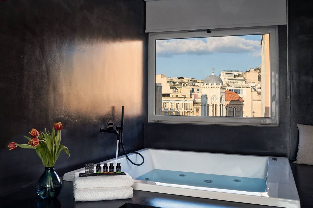 loft, 1 king bed, jetted tub | bathroom | shower, rainfall showerhead, free toiletries, hair dryer