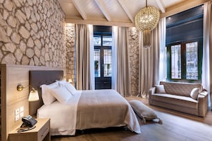 Suite junior | Ropa de cama de alta calidad y minibar