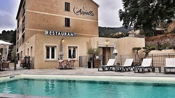 Seasonal outdoor pool, pool umbrellas, sun loungers