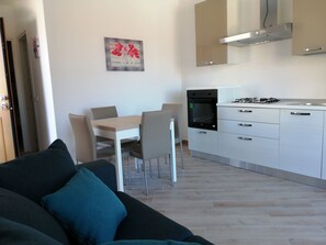 Comfort Apartment, 1 Bedroom, Mountain View | Private kitchenette | Full-size fridge, oven, stovetop, cookware/dishes/utensils - Appartamenti Mareblu (Badesi)