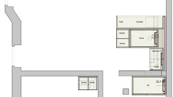 Et gulvplan over et hotelværelse med tekøkken, bruseområde og toilet.