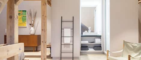 Shower, rainfall showerhead, designer toiletries, hair dryer