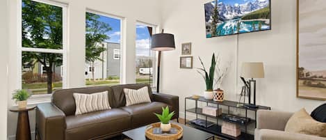 Smart TV, fireplace, table football, books