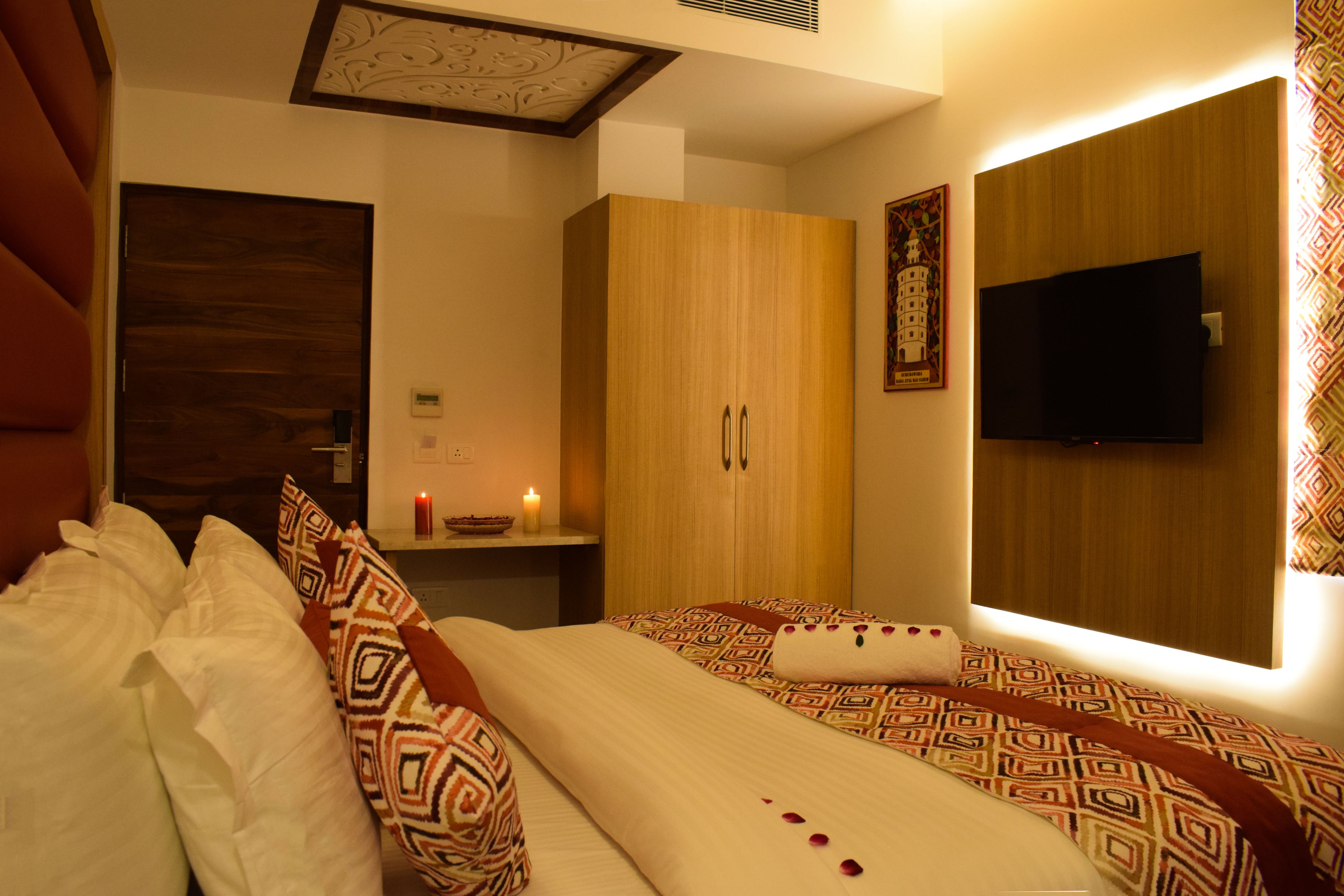 executive premium  | premium bedding, blackout curtains, free wifi, bed sheets