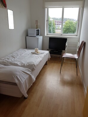 Basic-enkeltværelse - 1 enkeltseng | Gratis Wi-Fi, sengetøj