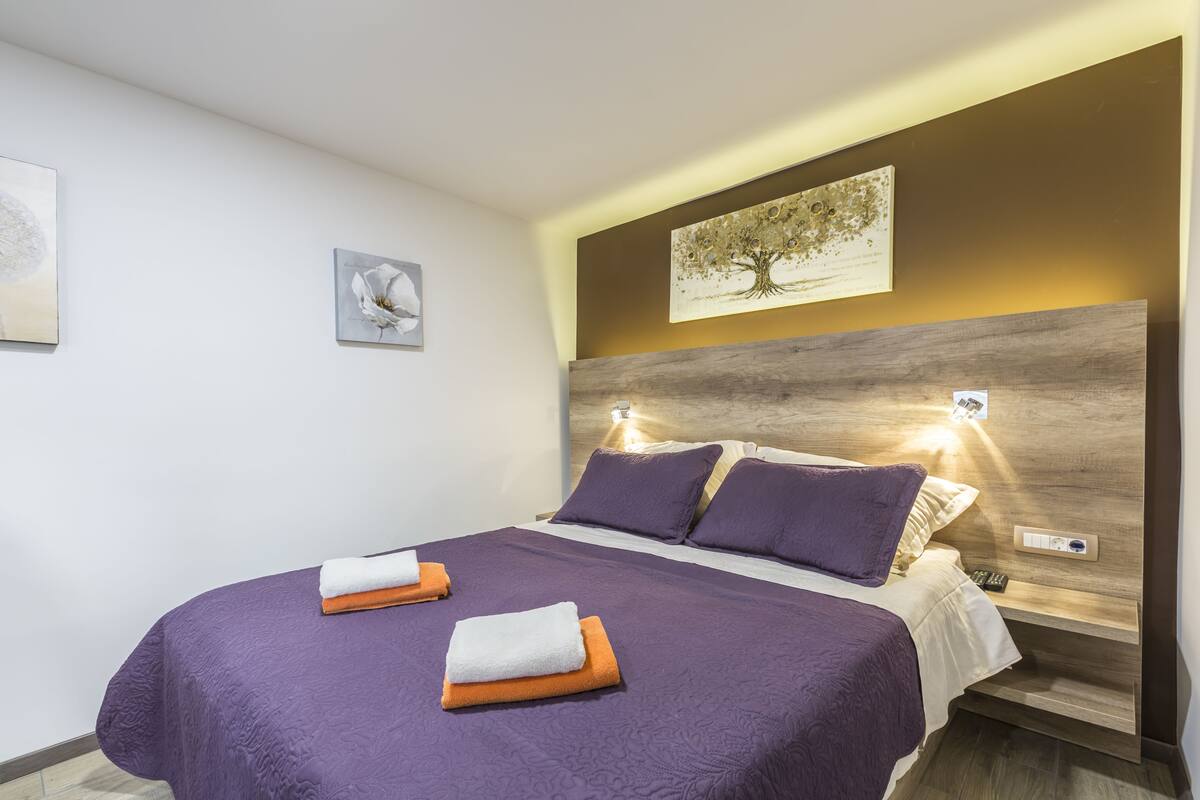Apartment, 1 Bedroom | In-room safe, soundproofing, iron/ironing board, free WiFi
