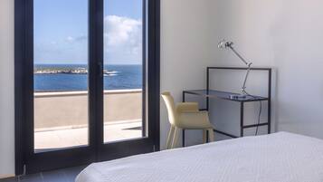 Deluxe Suite, Multiple Beds, Sea View | Blackout curtains, iron/ironing board, free WiFi, bed sheets