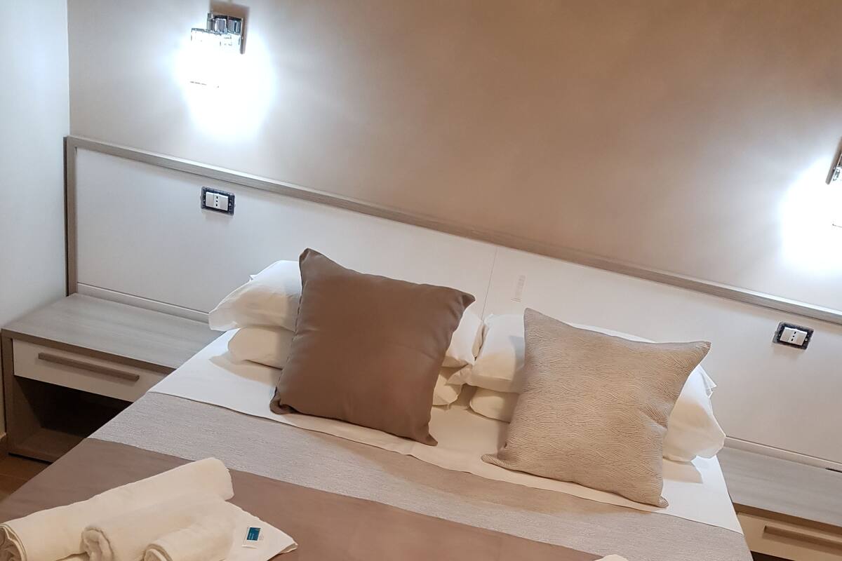 Comfort Double Room, Ensuite, Partial Sea View | Frette Italian sheets, premium bedding, memory foam beds, minibar