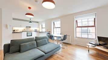 Comfort Apartment, 2 Bedrooms | Living area | Flat-screen TV