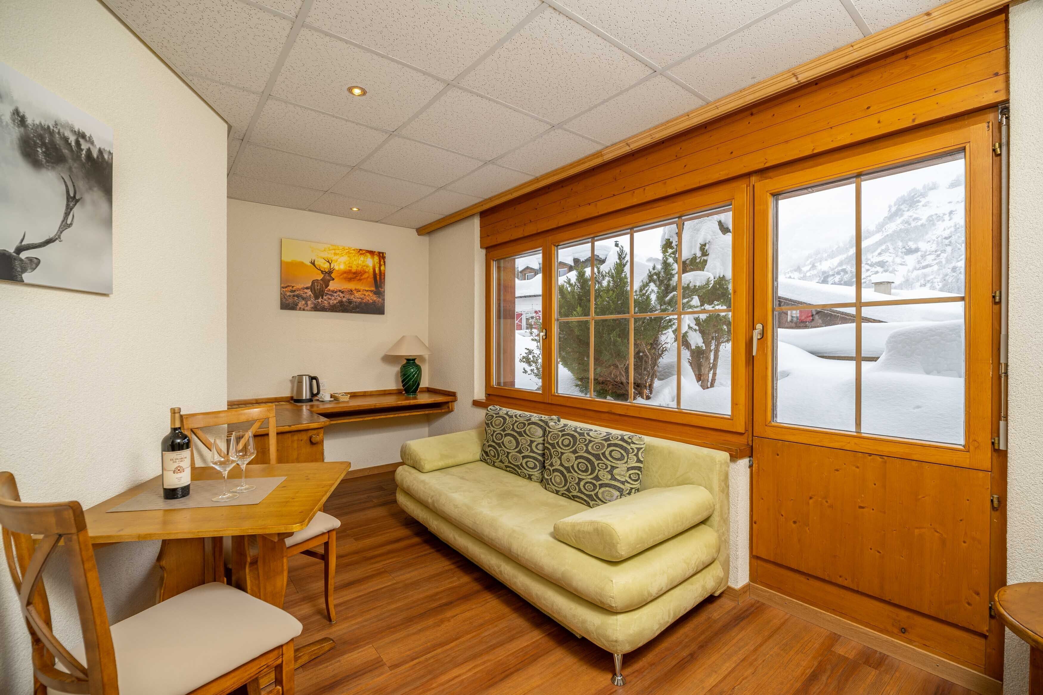 family quadruple room, balcony, mountain view | 1 bedroom, in-room safe, individually decorated, desk