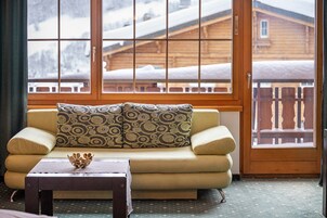 Family Studio, Balcony, Mountain View | In-room safe, individually decorated, desk, laptop workspace