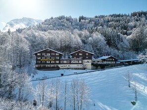 Experience the charm of Hotel Banklialp, nestled in a serene mountainous setting, offering a restaurant and comfortable accommodations.