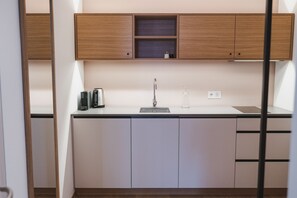 独特公寓, 阳台, 庭院景观 | 私人厨房 | 大冰箱、炉灶、洗碗机、意式浓缩咖啡机