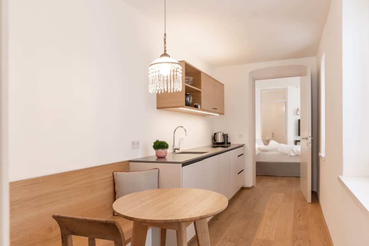Design Apartment, Kitchenette, Courtyard View | In-room dining