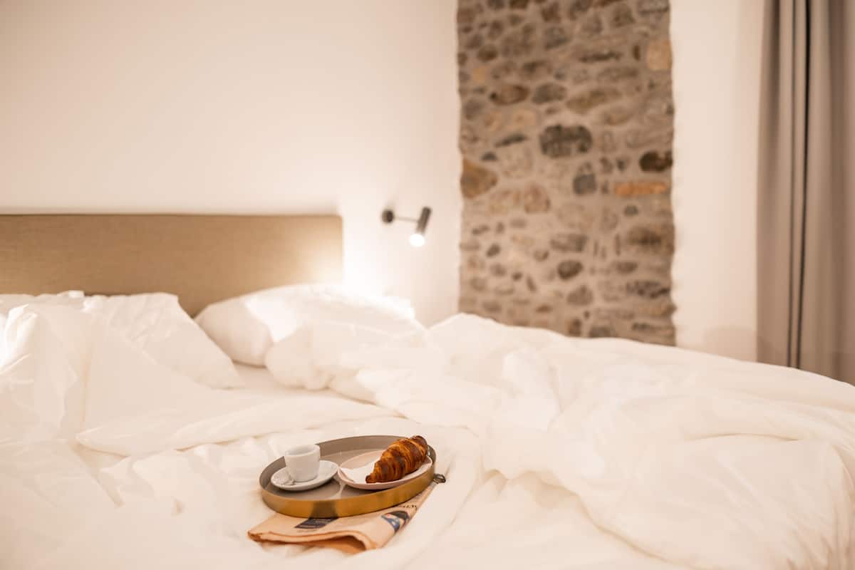 Luxury Apartment, Patio, Courtyard View | Premium bedding, down duvets, in-room safe, individually decorated