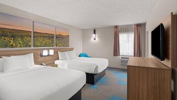 Suite, Multiple Beds, Non Smoking | Down comforters, desk, laptop workspace, blackout drapes