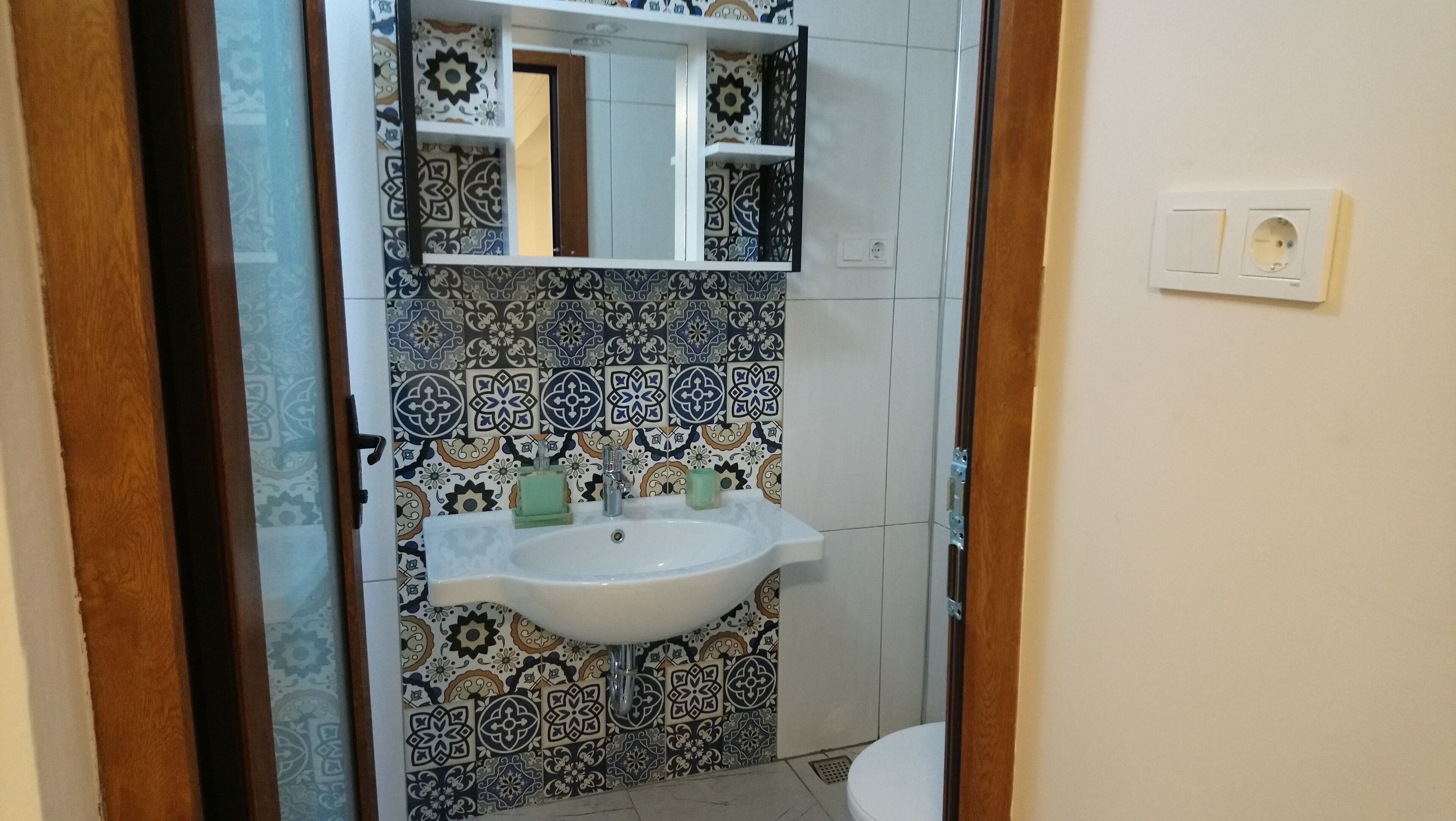 family room, courtyard view | bathroom | shower, free toiletries, hair dryer, slippers