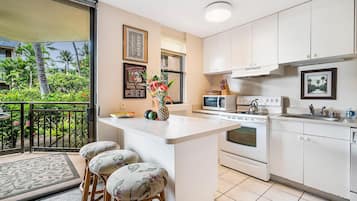 Condo, 1 Queen Bed (Kona Makai 2-102) | Private kitchen | Fridge, microwave, stovetop, dishwasher