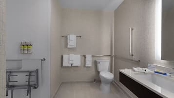Standard Room, 1 King Bed, Accessible (Roll-In Shower) | Bathroom | Combined shower/tub, free toiletries, hair dryer, towels
