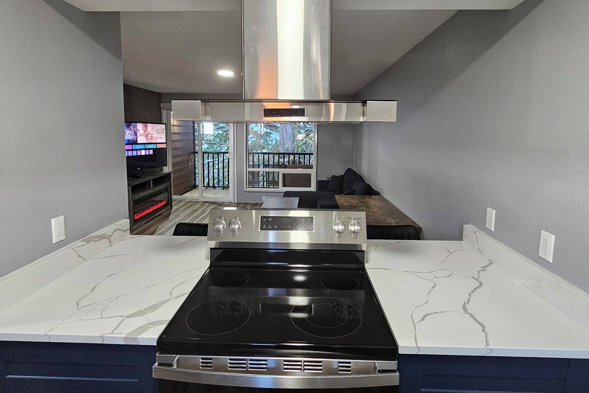 full-sized fridge, microwave, dishwasher, coffee/tea maker