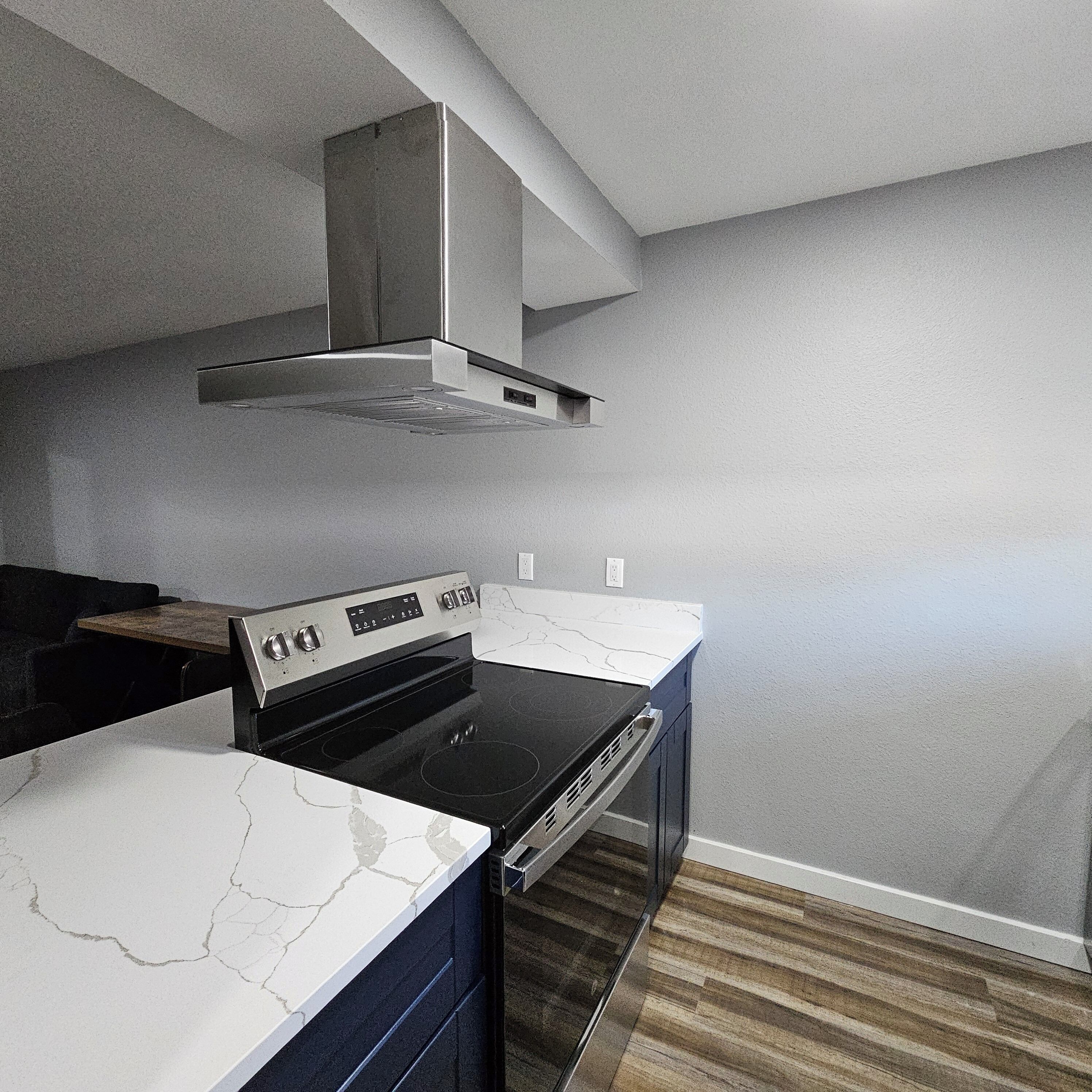 full-sized fridge, microwave, dishwasher, coffee/tea maker